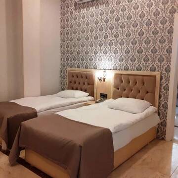 Фото номера Семейный двухместный номер с 1 кроватью Отель Ruma Qala Hotel г. Шеки 3